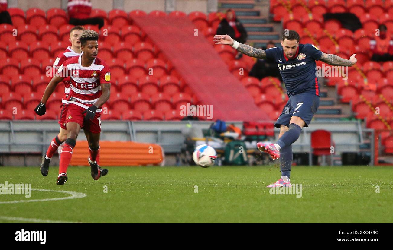 Jason Lokilo tries to close down a Chris Maguire strike during the first half during the Sky Bet League 1 match between Doncaster Rovers and Sunderland at the Keepmoat Stadium, Doncaster on Saturday 21st November 2020. (Photo by Michael Driver/MI News/NurPhoto) Stock Photo