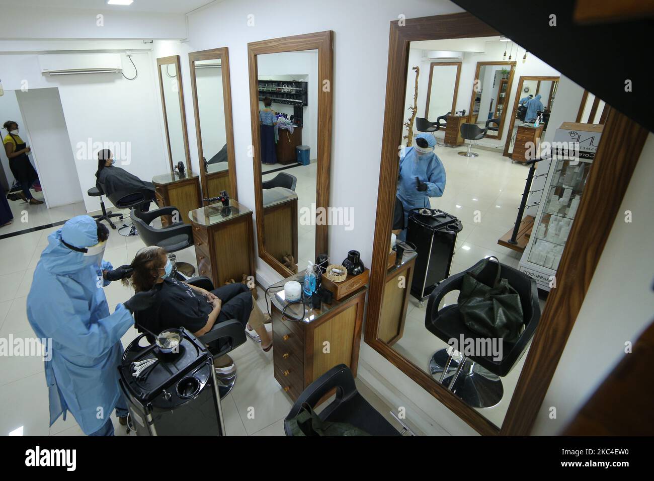 Sri Lankan hair dresser Sanjeewa Ranathunga wearing personal protective