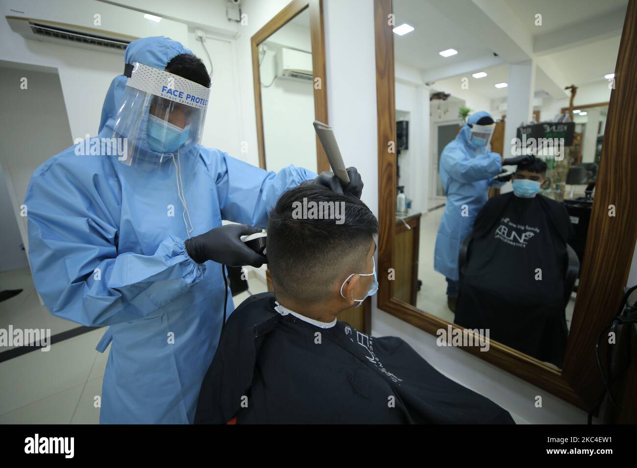 Sri Lankan hair dresser Sanjeewa Ranathunga wearing personal protective