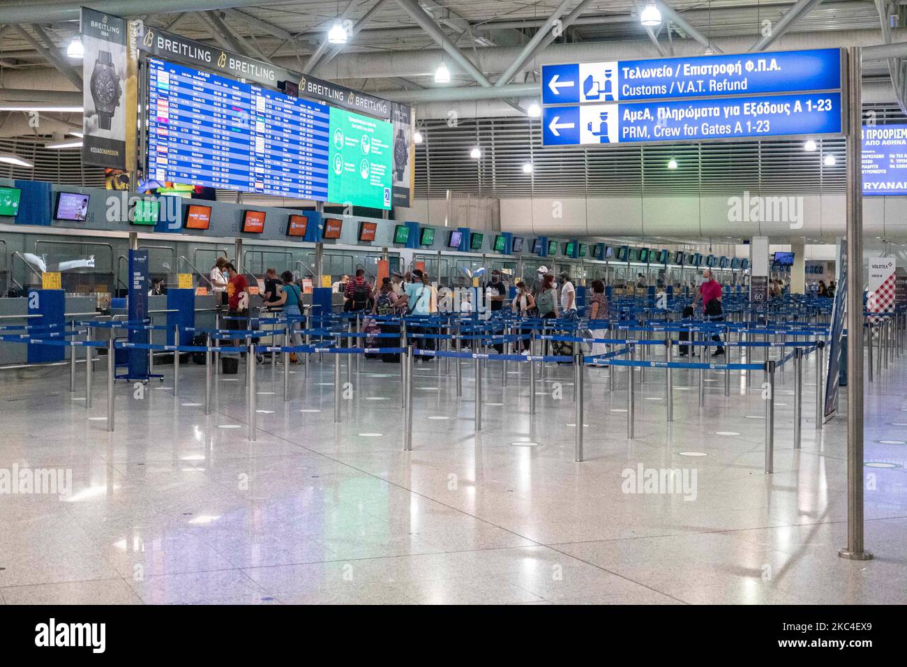 Passengers seen with the obligatory face masks at the main departure