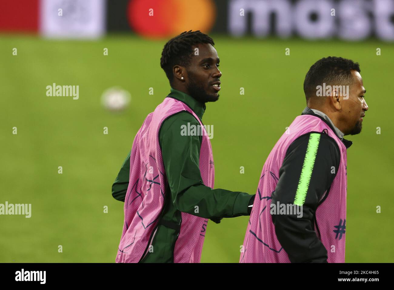 BUDAPEST, HUNGARY - JULY 13: Aleksa Amanovic of FC Tobol challenges  Kristoffer Zachariassen of Ferencvarosi TC during the UEFA Champions League  2022/23 First Qualifying Round Second Leg match between Ferencvarosi TC and