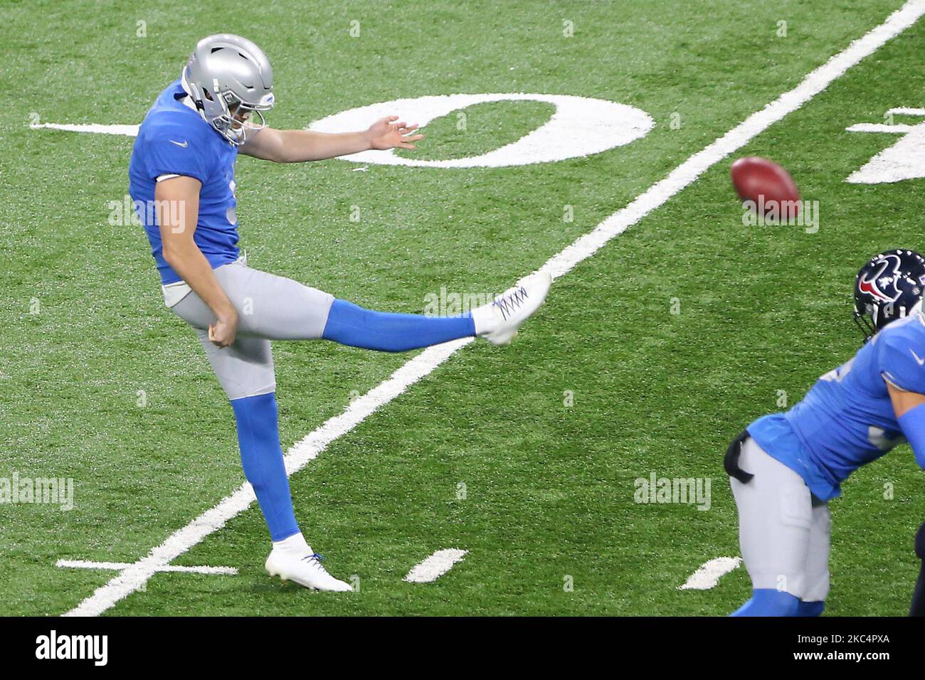 Detroit Lions punter Jack Fox (3) kicks off against the Green Bay