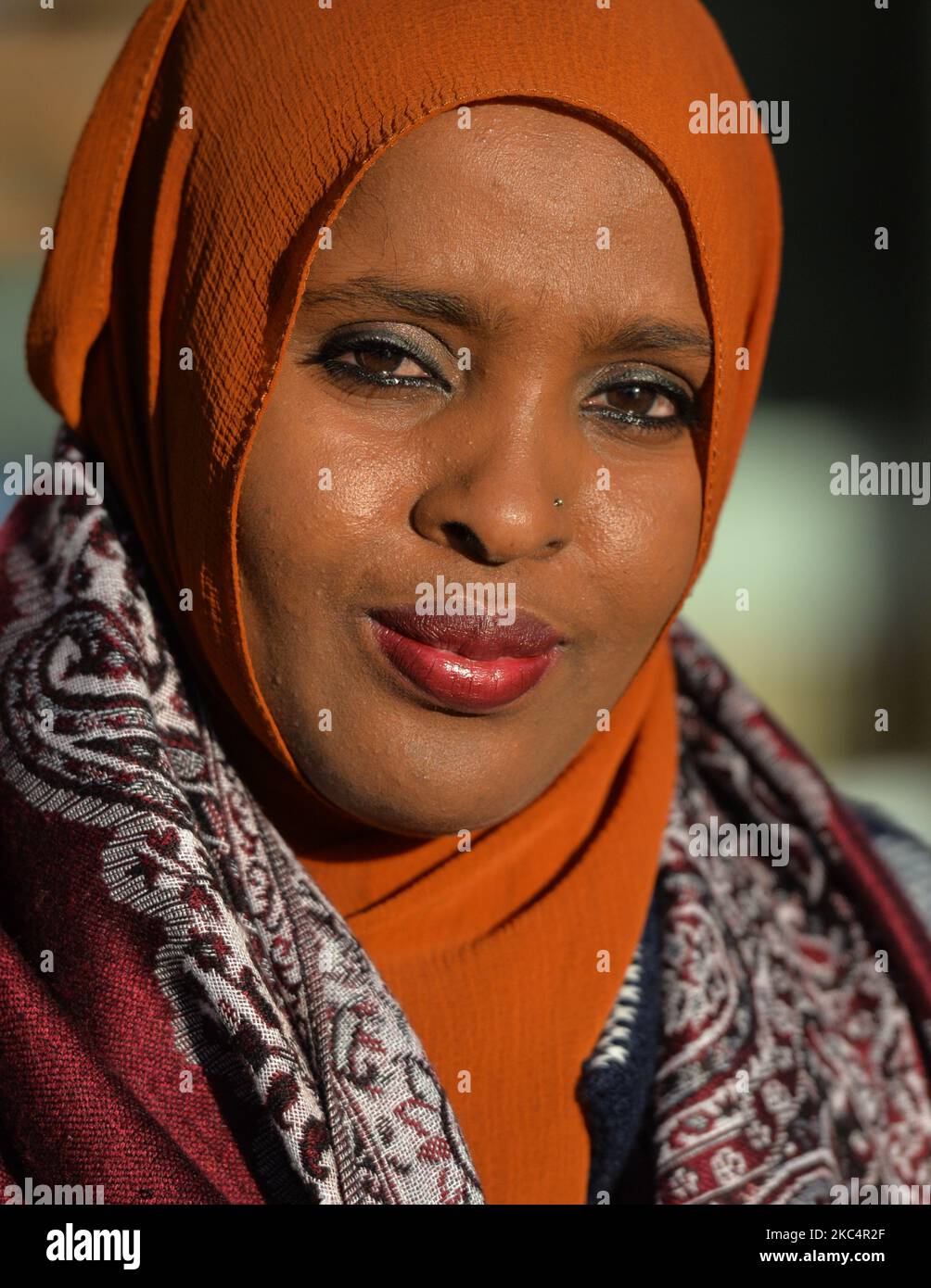 A portrait of Ifrah Ahmed, a Somali-Irish social activist. Born into a refugee camp in war-torn Somalia, Ifrah was trafficked to Ireland as a teenager. Recounting her traumatic childhood experiences of Female Genital Mutilation / Cutting (FGM/C) when applying for refugee status, she was again traumatized and decided to devote her life to the eradication of the practice. Ifrah emerged as one of the worlds foremost international activists against Gender Based Violence, after she took her campaign all the way to the President of Ireland and finally to the European Parliament and United Nations. S Stock Photo