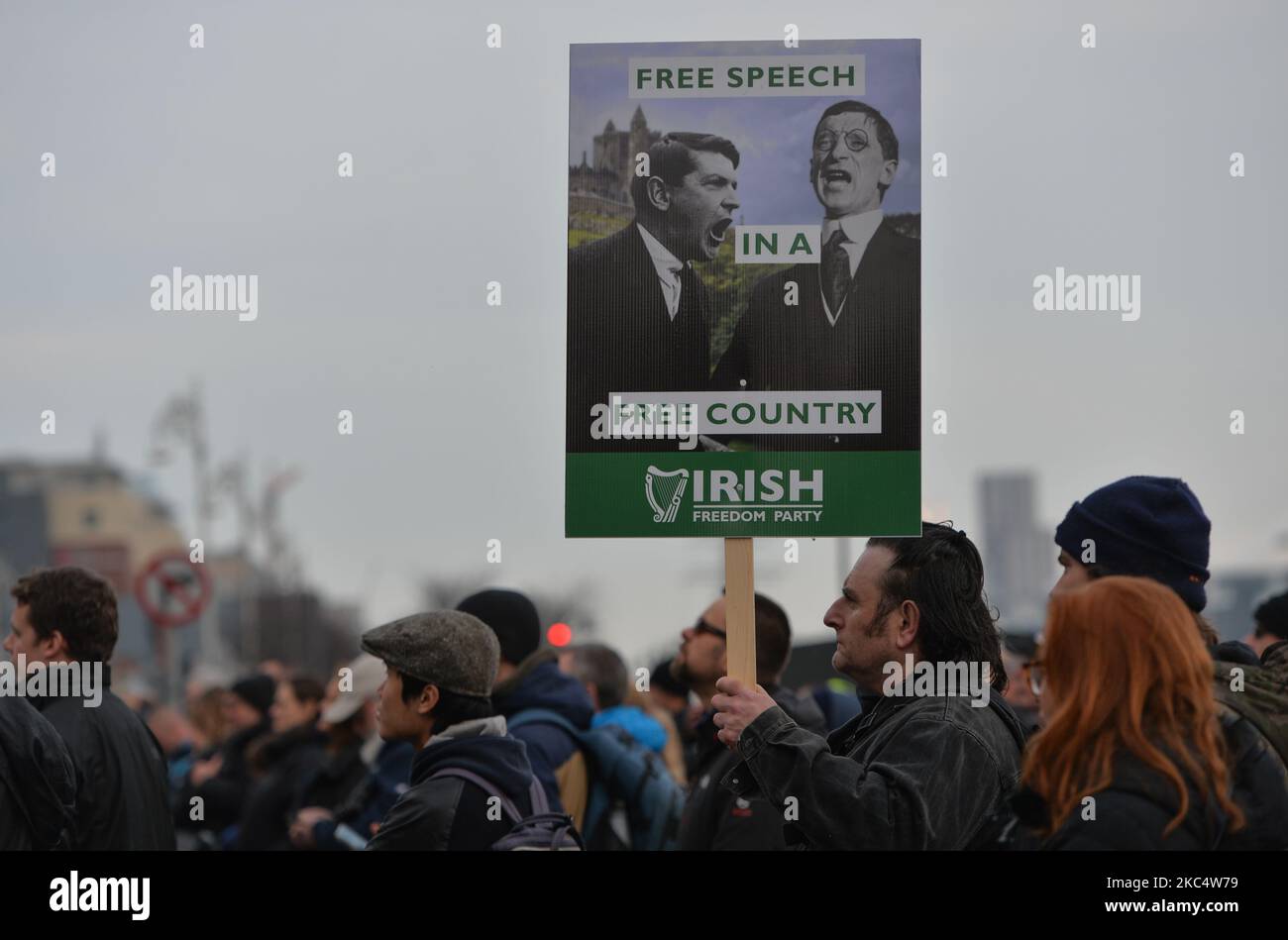 A protester holds a placard that reads 'Free Speech In A Free Country' during the Irish Freedom Party anti-vaccination and anti-lockdown rally, on day 39 of the nationwide Level 5 lockdown. On Saturday, November 28, 2020, in Dublin, Ireland. (Photo by Artur Widak/NurPhoto) Stock Photo