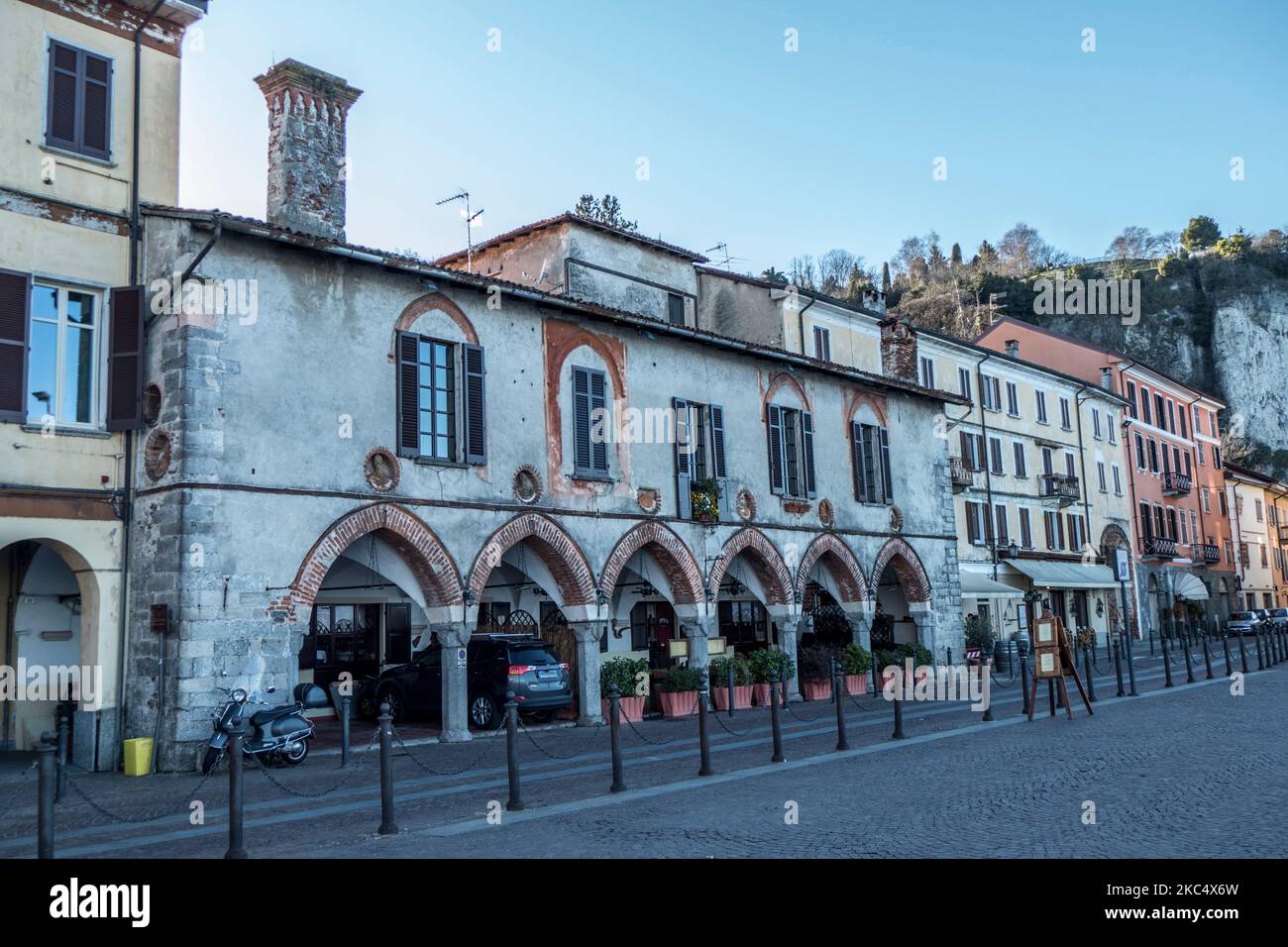 The central square of Arona with beautiful arch Stock Photo Alamy