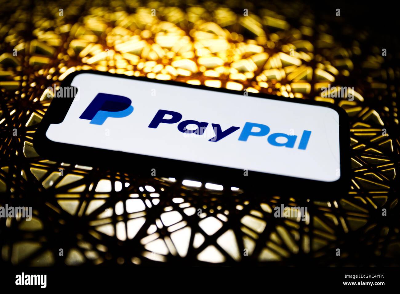 PayPal logo is seen displayed on a phone screen in this illustration photo taken in Poland on November 29, 2020. (Photo illustration by Jakub Porzycki/NurPhoto) Stock Photo