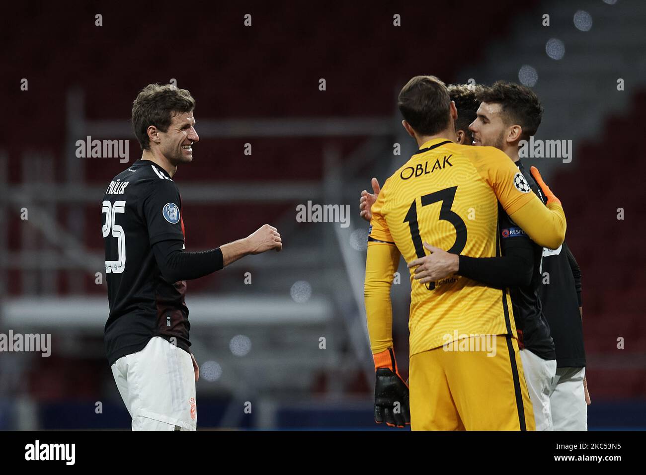 Thomas Muller of Bayern greets Jan Oblak of Atletico Madrid after the UEFA Champions League Group A stage match between Atletico Madrid and FC Bayern Muenchen at Estadio Wanda Metropolitano on December 1, 2020 in Madrid, Spain. (Photo by Jose Breton/Pics Action/NurPhoto) Stock Photo