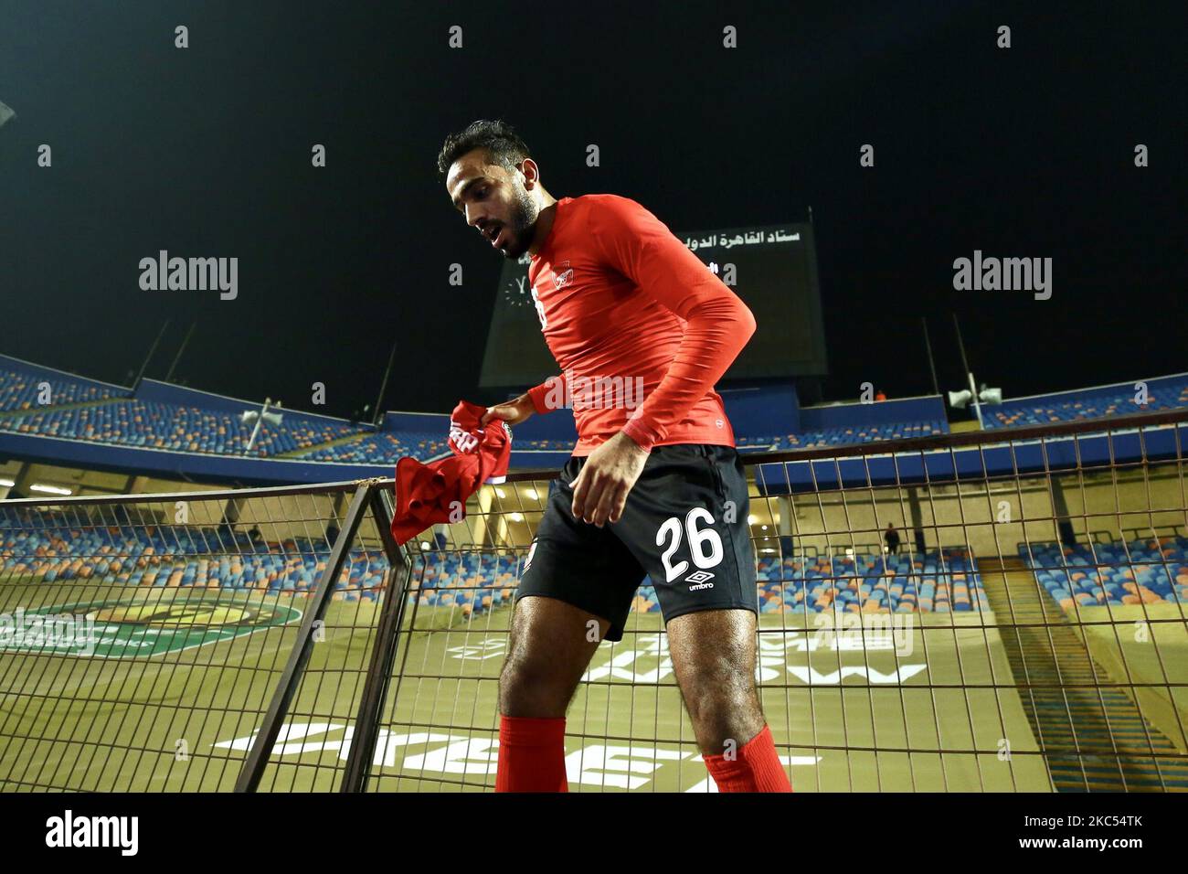 Mahmoud Kahraba of Al Ahly celebrate with the trophy of CAF Champions League after winning the final match between Zamalek and Al Ahly at Cairo stadium on 27 November, 2020 in Cairo, Egypt. (Photo by Ahmed Awaad/NurPhoto) Stock Photo
