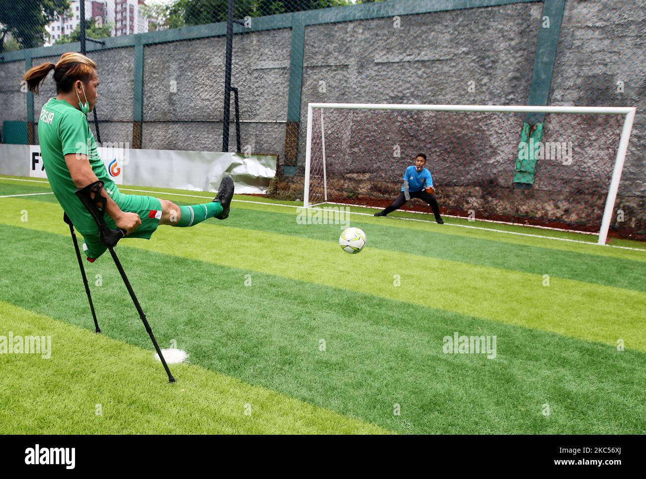 The Garuda Indonesia Amputee Football (INAF) Team footballer conducts