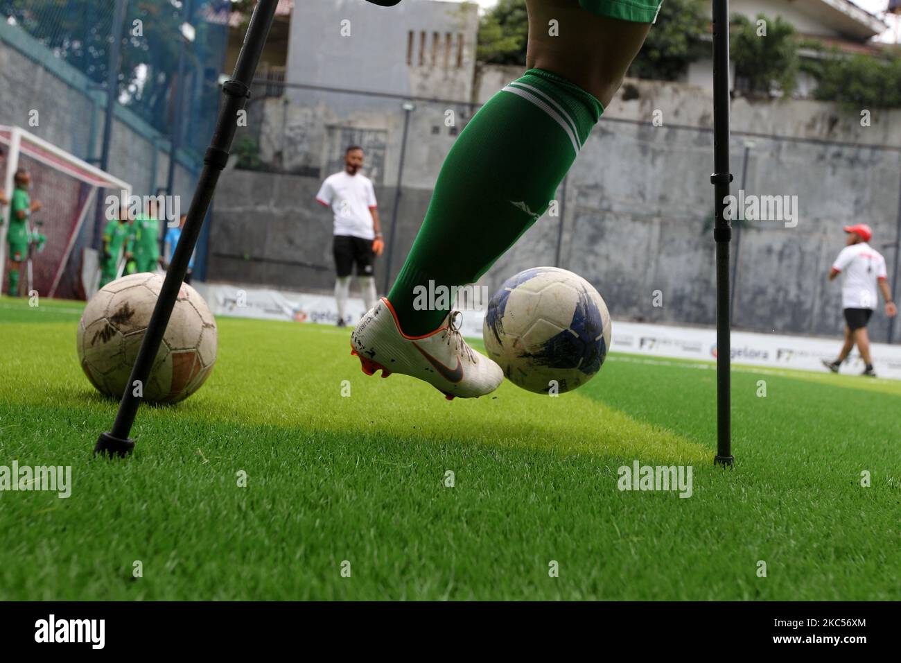 The Garuda Indonesia Amputee Football (INAF) Team footballer conducts soccer training at the F7