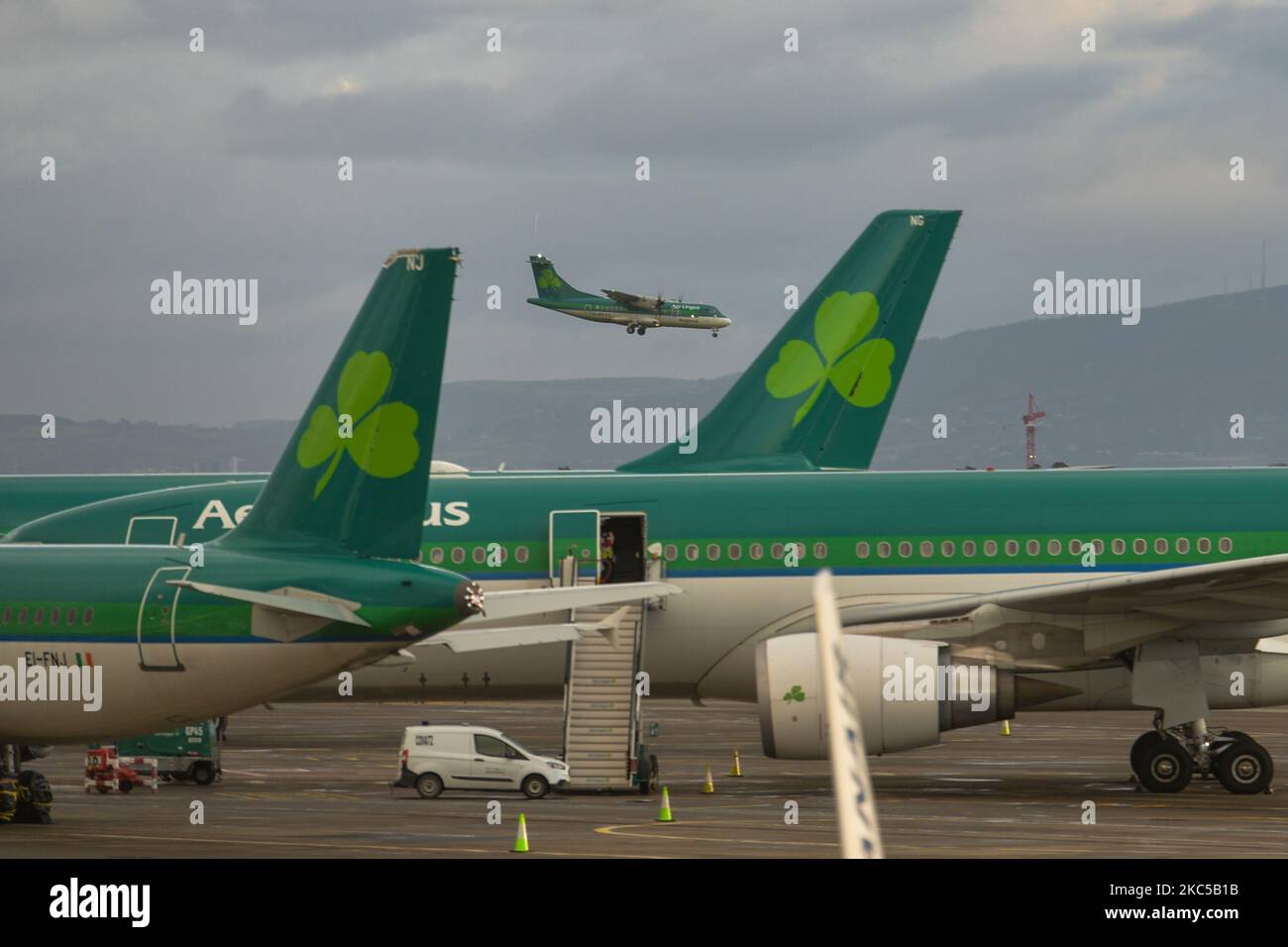 Aer Lingus planes seen at Dublin Airport, during the coronavirus lockdown level 3. The pandemic has had a 'devastating' impact on the operator of Dublin airport. DAA's losses at the beginning of September 2020 were approaching €150 million - according to its chief executive Dalton Philips. Many airports across the EU are now under intense financial pressure due to the slump in passenger numbers because of the Covid pandemic. On Saturday, December 05, 2020, in Dublin Airport Dublin, Ireland. (Photo by Artur Widak/NurPhoto) Stock Photo