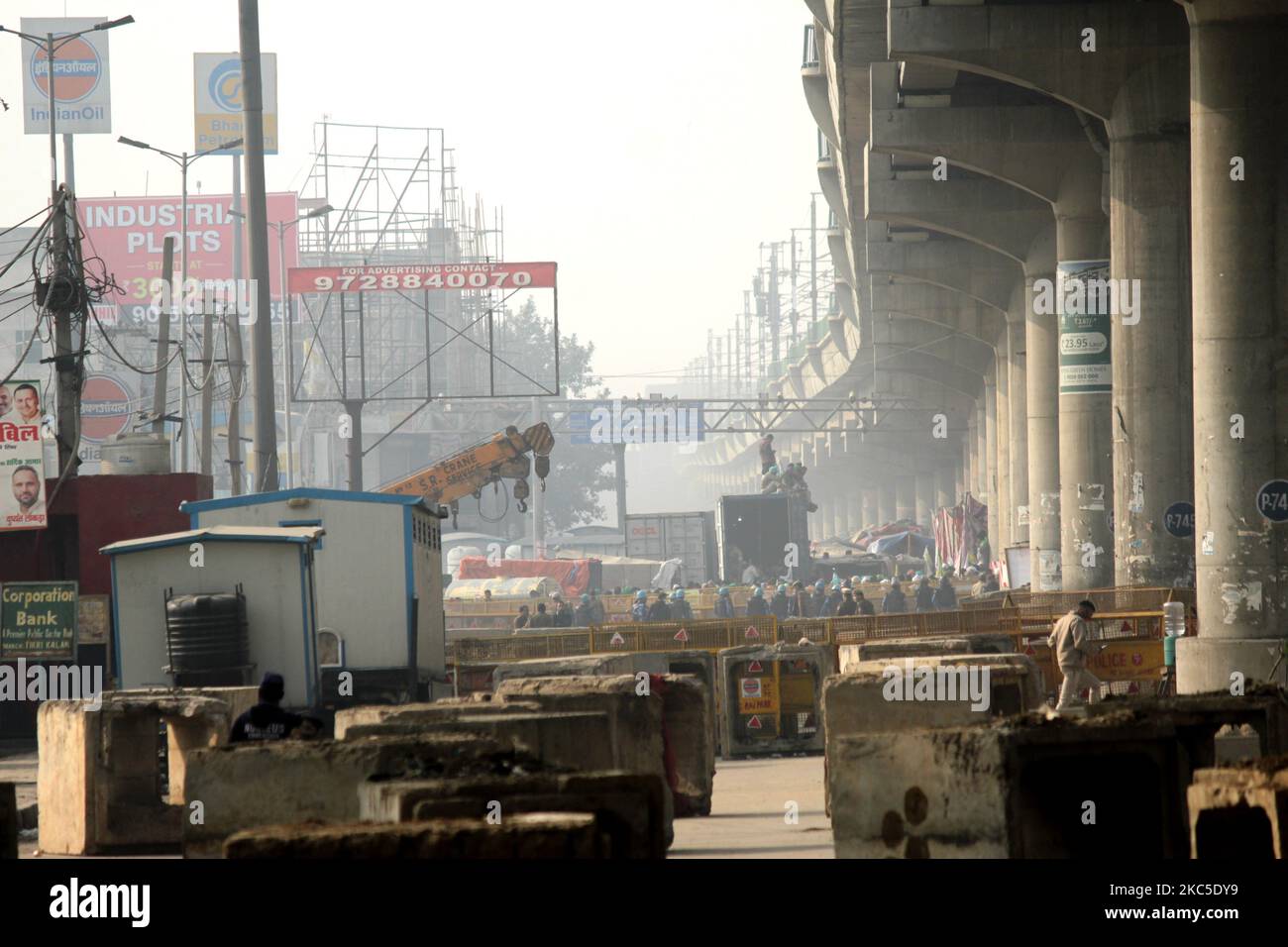 A view of roadblocks installed by Delhi Police to block highway during farmers protest against the Centre's new farm laws at Tikri border near New Delhi, India on December 7, 2020. (Photo by Mayank Makhija/NurPhoto) Stock Photo
