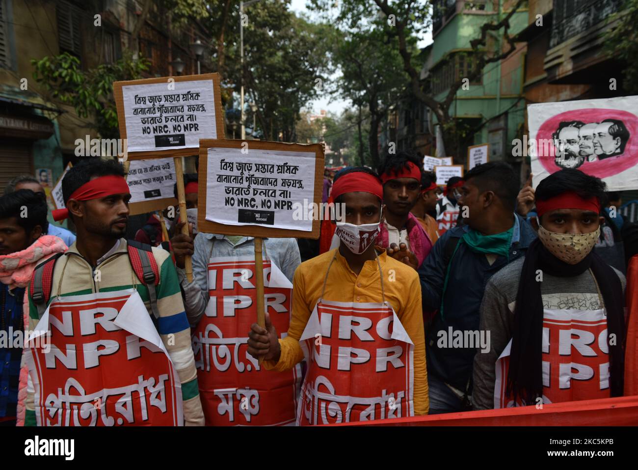 People take part in a demonstration against the controversial Citizenship Amendment Act, in Kolkata, India, on December 11, 2020. One year ago, on December 11th 2019, India's parliament passed the controversial Citizenship Amendment Act introduced by Mr. Amit Shah, Minister of Home Affairs. (Photo by Sukhomoy Sen/NurPhoto) Stock Photo
