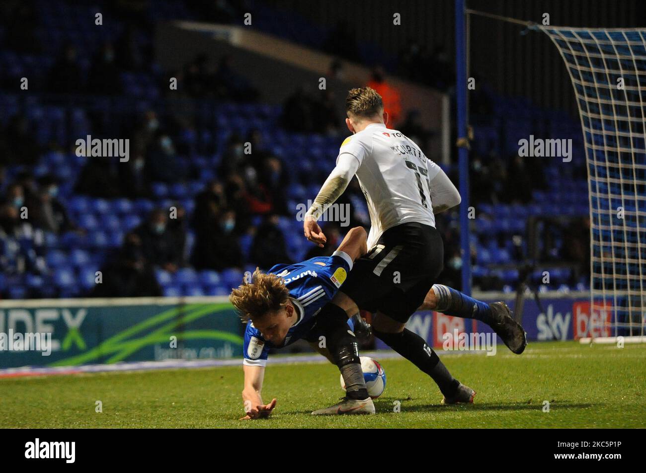 Portsmouths Ronan Curtis fouls Ipswichs Luke Woolfenden during the Sky Bet League 1 match between Ipswich Town and Portsmouth at Portman Road, Ipswich on Saturday 12th December 2020. (Photo by Ben Pooley/MI News/NurPhoto) Stock Photo