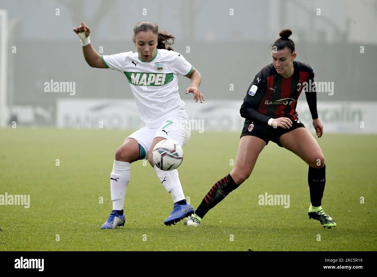Haley Bugeja of US Sassuolo competes for the ball with Giorgia Spinelli of AC Milan during the Women Serie A match between AC Milan and US Sassuolo at Centro Sportivo Vismara on December 13, 2020 in Milan, Italy. (Photo by Giuseppe Cottini/NurPhoto) Stock Photo
