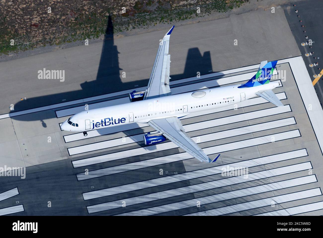 Jetblue Airways Airbus A321 airplane landing on runway, Aircraft A321 of Jet Blue airline registered as N979JT. Plane with winglets. Stock Photo