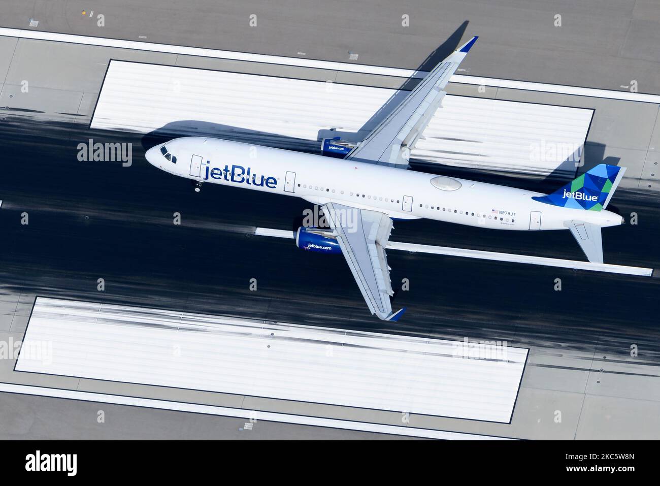 JetBlue Airbus A321 aircraft landing on airport runway. Airplane A321 of Jet Blue airline registered as N979JT. Stock Photo