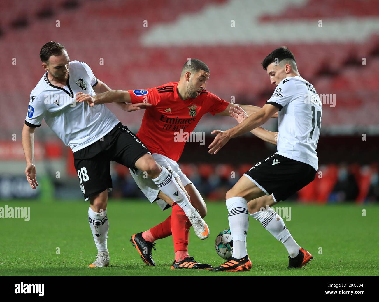 Adel Taarabt of SL Benfica with Nicolas Janvier and Pepelu of Vitoria SC in action during the Portuguese League Cup match between SL Benfica and Vitoria SC at Estadio da Luz on December 16, 2020 in Lisbon, Portugal.(Photo by Paulo Nascimento/NurPhoto) Stock Photo