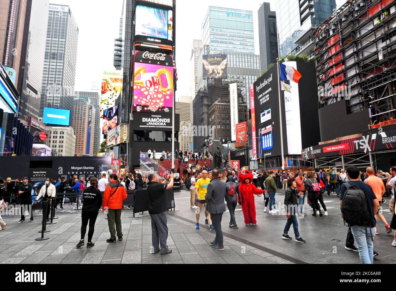 NEW YORK 25 OCT 2022 Tourists crowd the plaza in Time Square in Midtown Manhattan Stock Photo