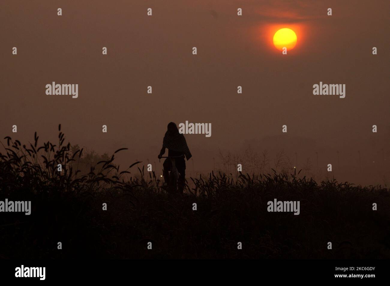 Local residents are seen on their native road as they walks out in a ...