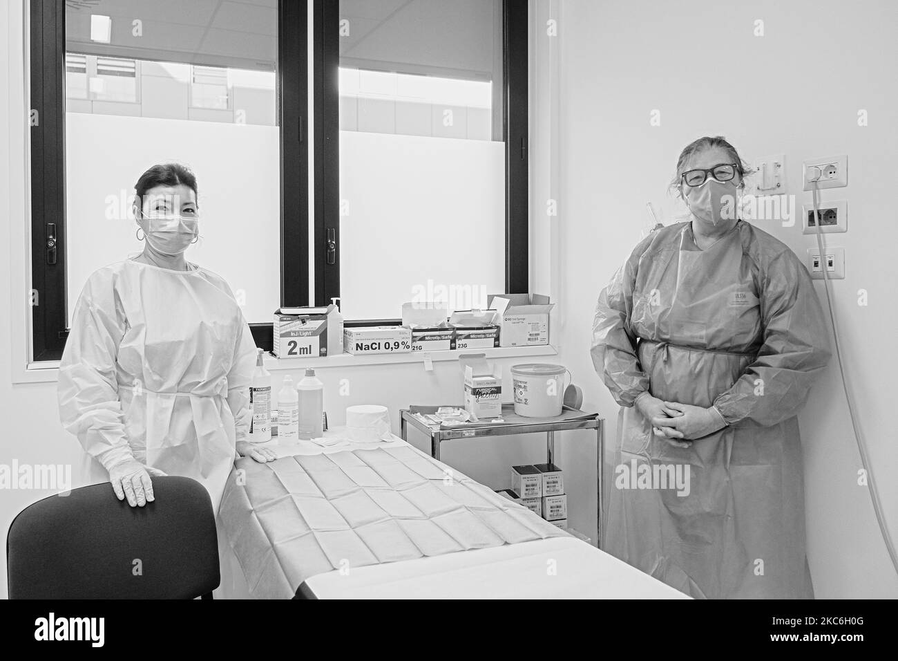 (EDITOR'S NOTE: Image was converted to black and white) The vaccine against Covid19 developed by Pfizer-Biontech is now distributed throughout the hospitals of Italy, and in this case at the Schiavonia hospital. Health personnel, deployed at the forefront of the war against the spread of the virus, will be the first to receive the vaccine. In the photoinfemiere in charge of vaccinations posing. Schiavonia, Padova, Italy, December 27, 2020. (Photo by Roberto Silvino/NurPhoto) Stock Photo