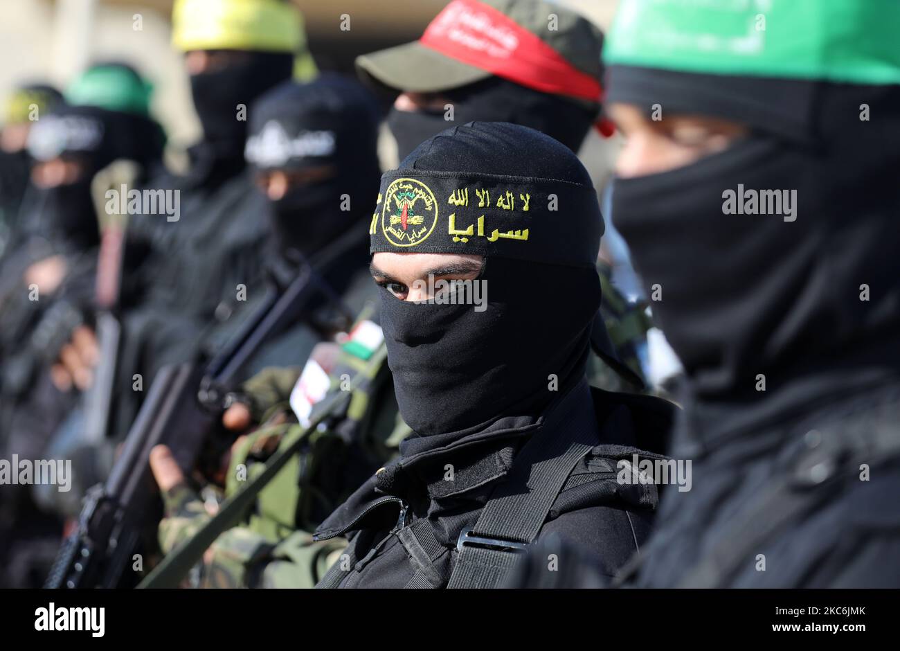 Members of Palestinian militant groups take part in their first-ever