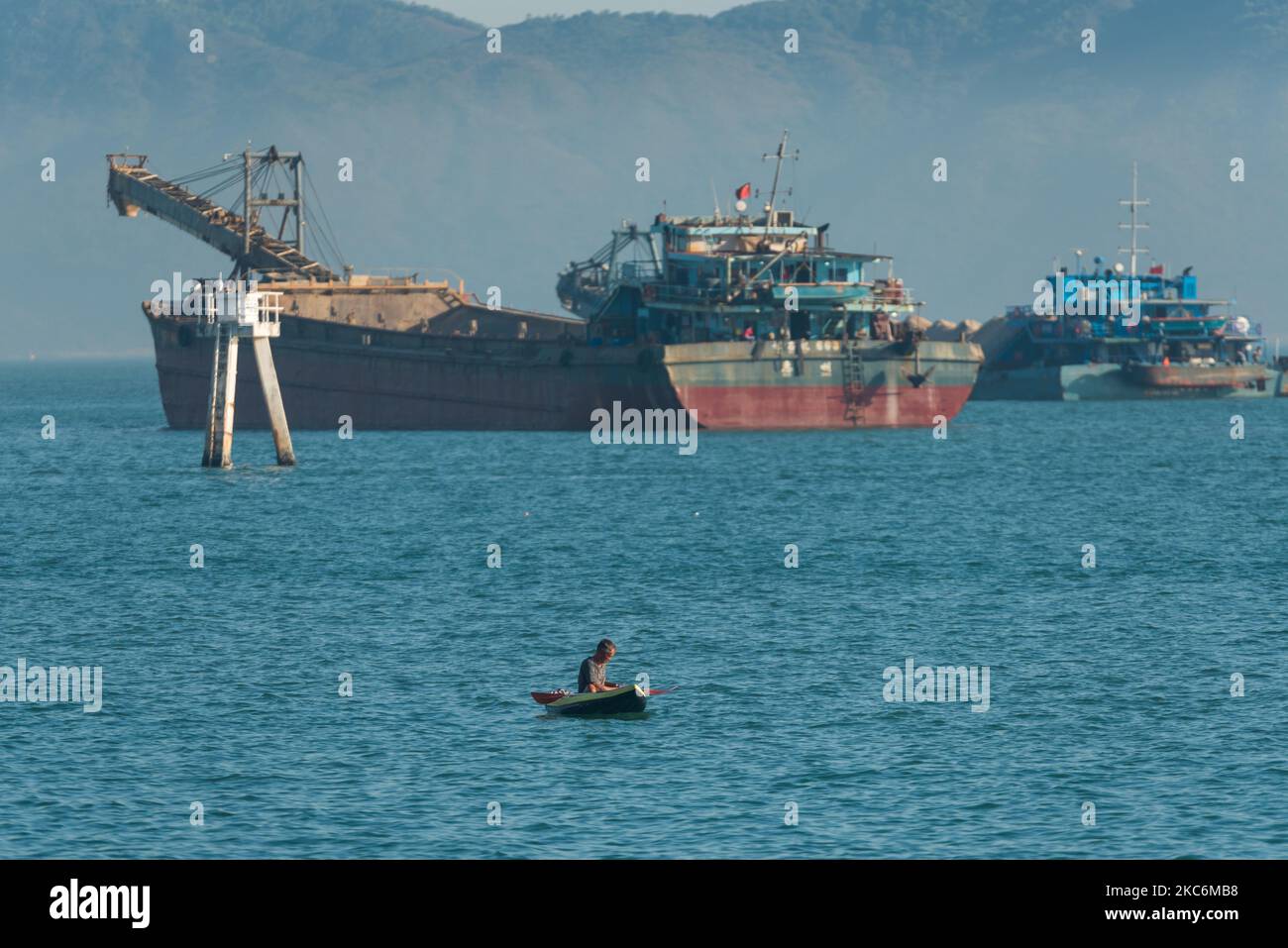 Hong Kong, China, 29 Dec 2020, A Hongkonger took to a kayak in Tuen Mun to seek some freedom from masking obligations in the outdoors. (Photo by Marc Fernandes/NurPhoto) Stock Photo