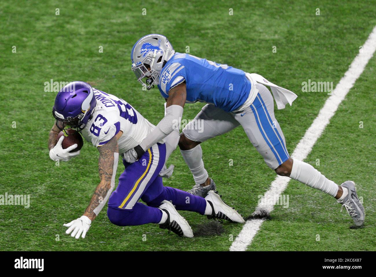 Minnesota Vikings tight end Tyler Conklin (83) is tackled by Detroit Lions defensive back Tracy Walker (21) during the first half of an NFL football game in Detroit, Michigan USA, on Sunday, January 3, 2021. (Photo by Jorge Lemus/NurPhoto) Stock Photo