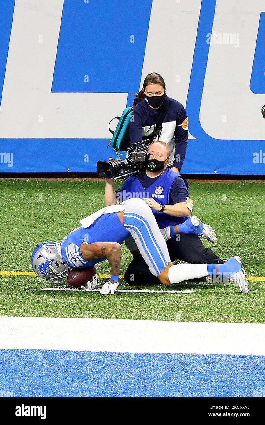 Detroit Lions wide receiver Marvin Jones (11) crashes into a videographer in the end zone during the first half of an NFL football game between the Detroit Lions and the Minnesota Vikings in Detroit, Michigan USA, on Sunday, January 3, 2021. (Photo by Amy Lemus/NurPhoto) Stock Photo