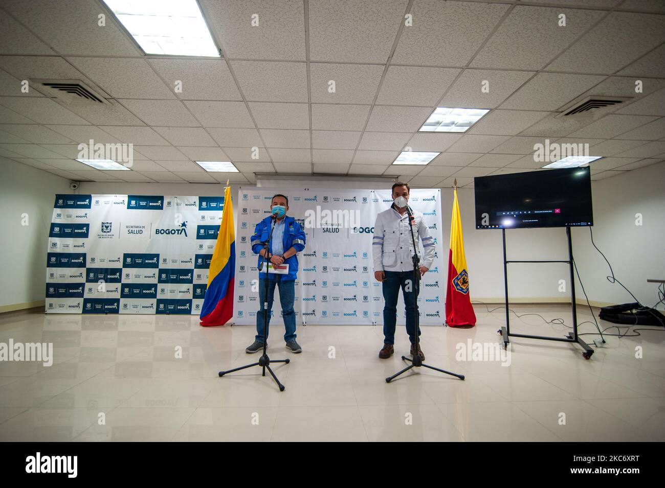 Mayor in charge, Luis Ernesto Gomez, right, along the secretary of