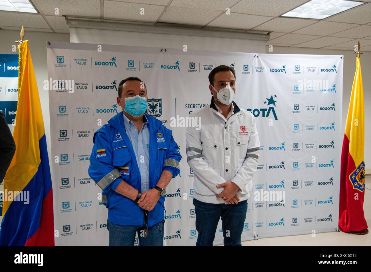 Mayor in charge, Luis Ernesto Gomez, right, along the secretary of