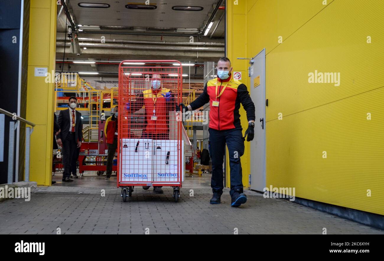 Employees load boxes with 25 000 Pfizer-BioNTech vaccines against COVID-19, arrived at Sofia Airport, Bulgaria, 04 January 2021. (Photo by Georgi Paleykov/NurPhoto) Stock Photo