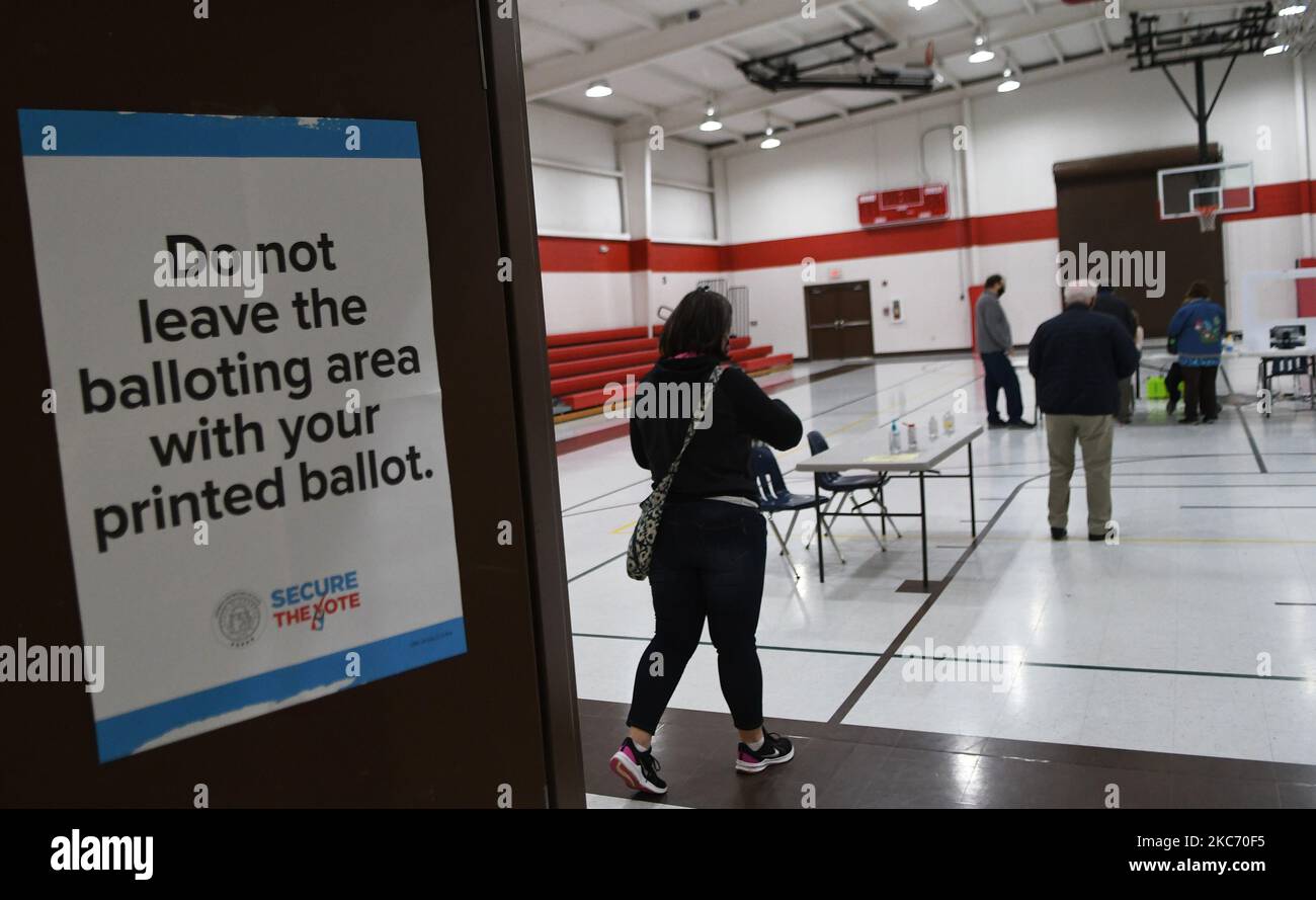 Voters arrive at a polling place at Varnell gymnasium on January 5, 2021 in Dalton, Georgia, USA. Republican Senators Kelly Loeffler and David Perdue are candidates in a run-off election on January 5 with Democrats Raphael Warnock and Jon Ossoff in a pair of contests which will determine which party controls the U.S. Senate. (Photo by Paul Hennessy/NurPhoto) Stock Photo