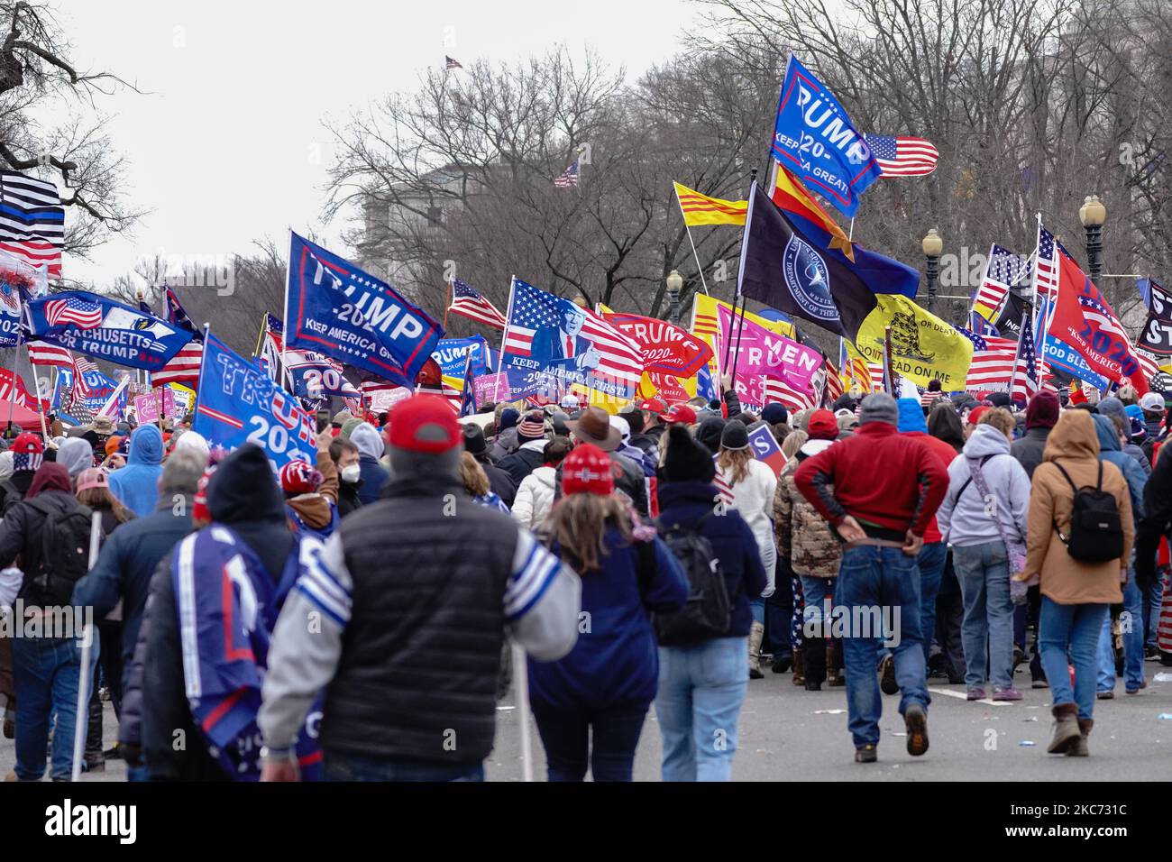 Thousands of supporters of US President Donald Trump march through the streets of the city as they make their way to the Capitol Building in Washington, DC on January 6, 2021. - Donald Trump's supporters stormed a session of Congress held today, January 6, to certify Joe Biden's election win, triggering unprecedented chaos and violence at the heart of American democracy and accusations the president was attempting a coup. (Photo by John Nacion/NurPhoto) Stock Photo