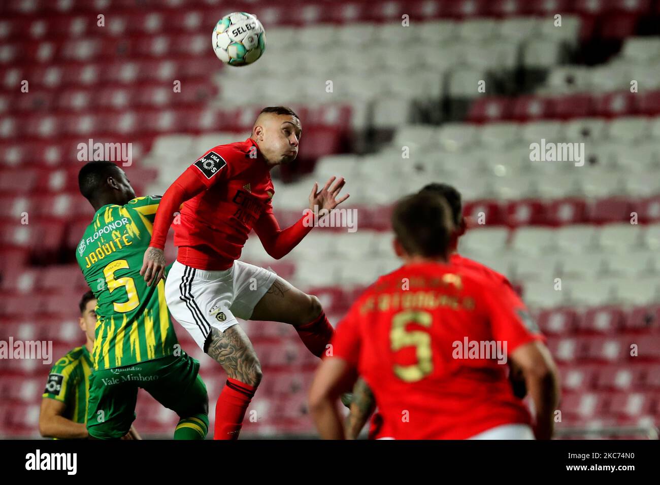 Everton of SL Benfica (top R ) vies with Jaquite of CD Tondela during the Portuguese League football match between SL Benfica and CD Tondela at the Luz stadium in Lisbon, Portugal on January 8, 2021. (Photo by Pedro FiÃºza/NurPhoto) Stock Photo