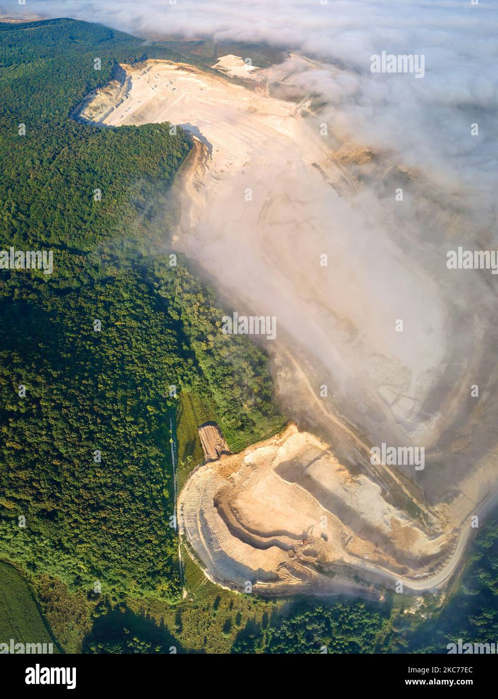 Aerial view of open pit mining site of limestone materials extraction