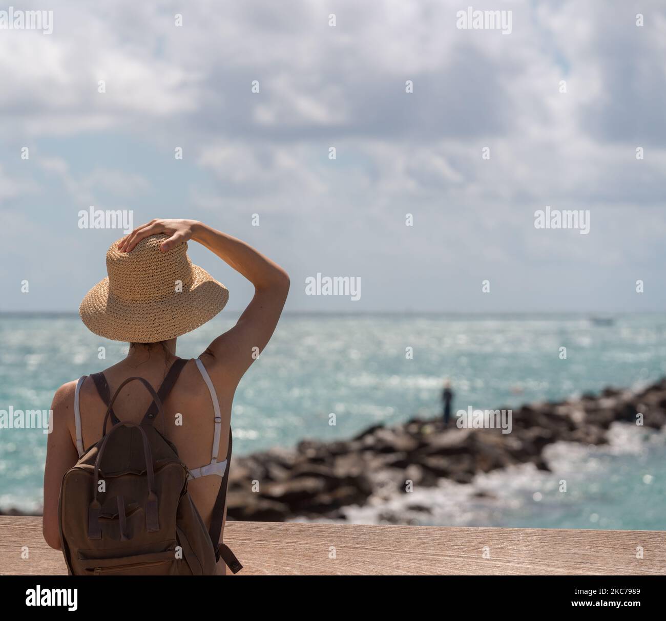 Girl on shore in straw hat hi-res stock photography and images - Alamy