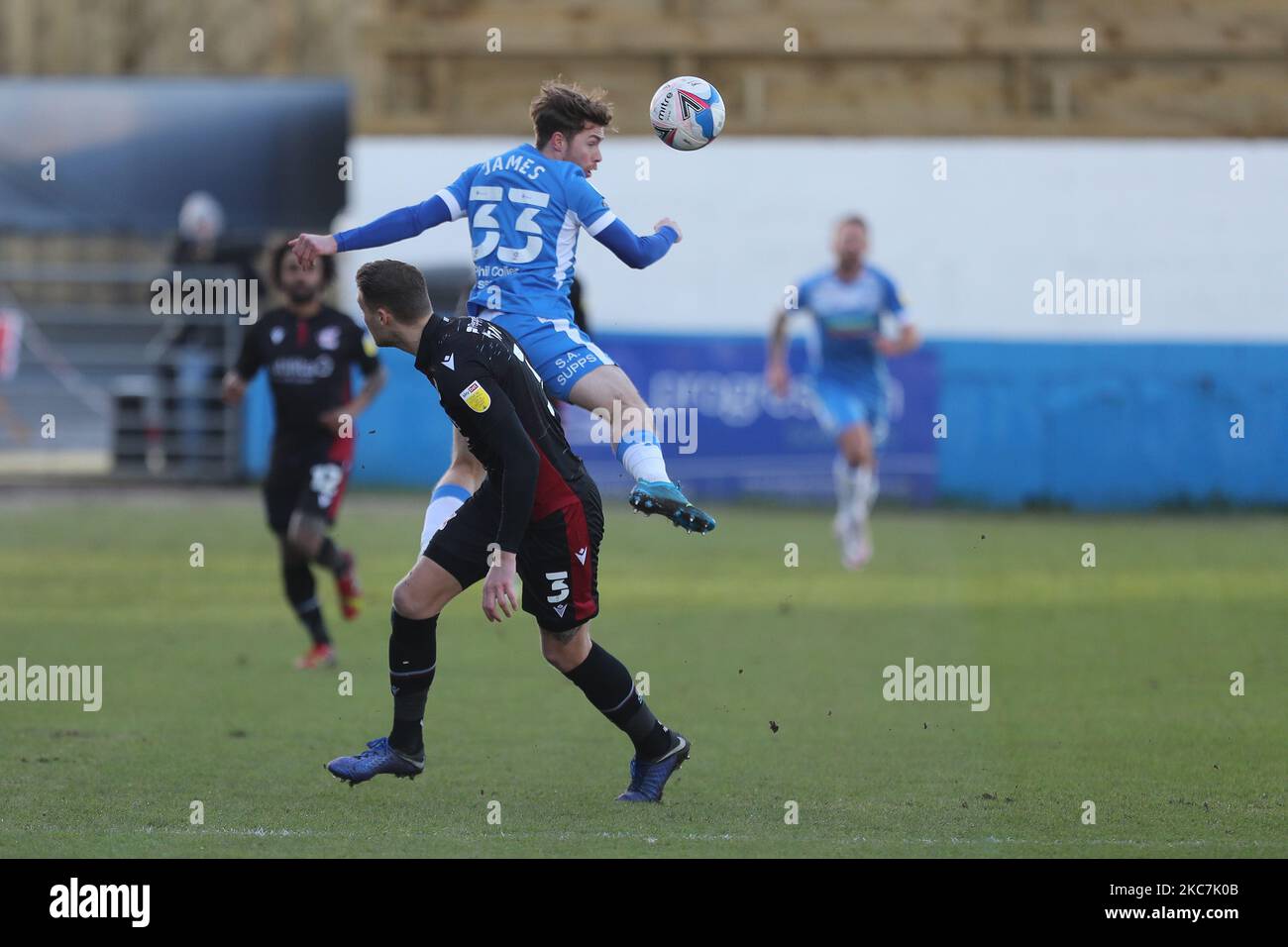 Luke James of Barrow contests a header with George Tait of Scunthorpe United during the Sky Bet League 2 match between Barrow and Scunthorpe United at the Holker Street, Barrow-in-Furness, England on 16th January 2021. (Photo by Mark Fletcher/MI News/NurPhoto) Stock Photo