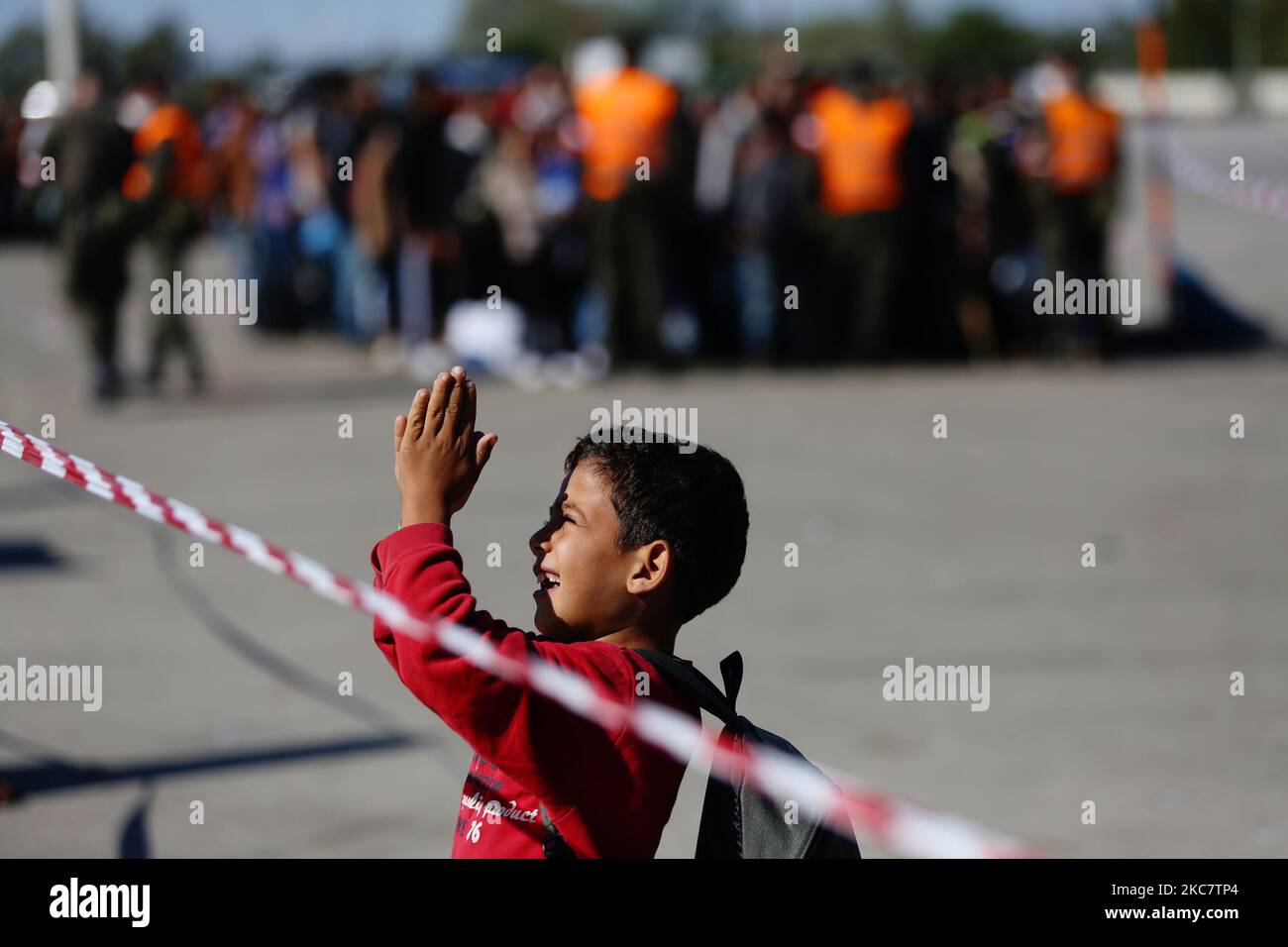 A refugee boy is seen at the Hungarian-Austrian border between Hegyeshalom and Nickelsdorf on 28 September 2015. A record number of refugees from the Middle East, Africa and Asia are using the so-called Balkans route to enter the EU. (Photo by Beata Zawrzel/NurPhoto) Stock Photo