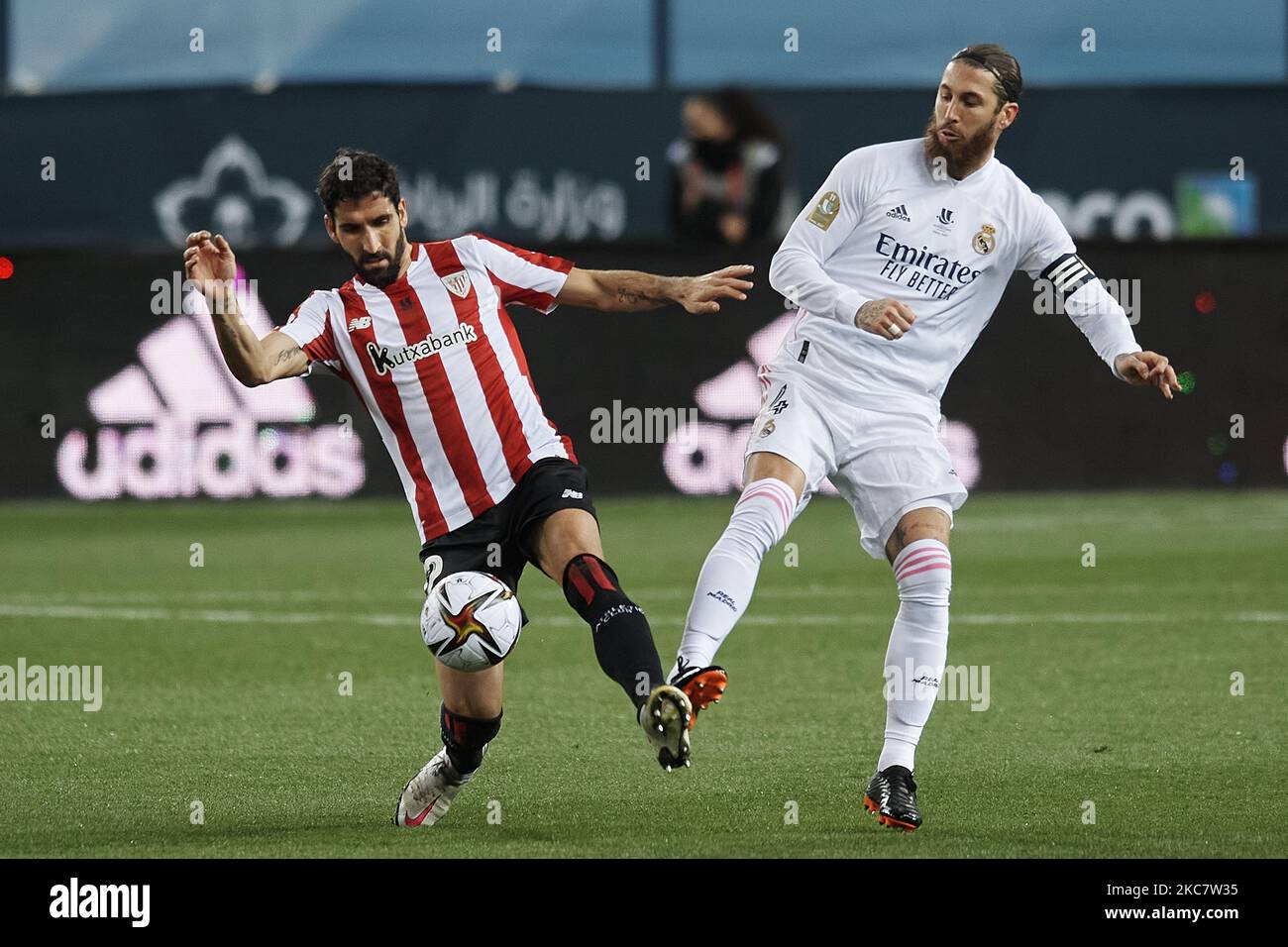 Sergio Ramos of Real Madrid and Raul Garcia of Athletic compete for the ball during the Supercopa de Espana Semi Final match between Real Madrid and Athletic Club at Estadio La Rosaleda on January 14, 2021 in Malaga, Spain. (Photo by Jose Breton/Pics Action/NurPhoto) Stock Photo