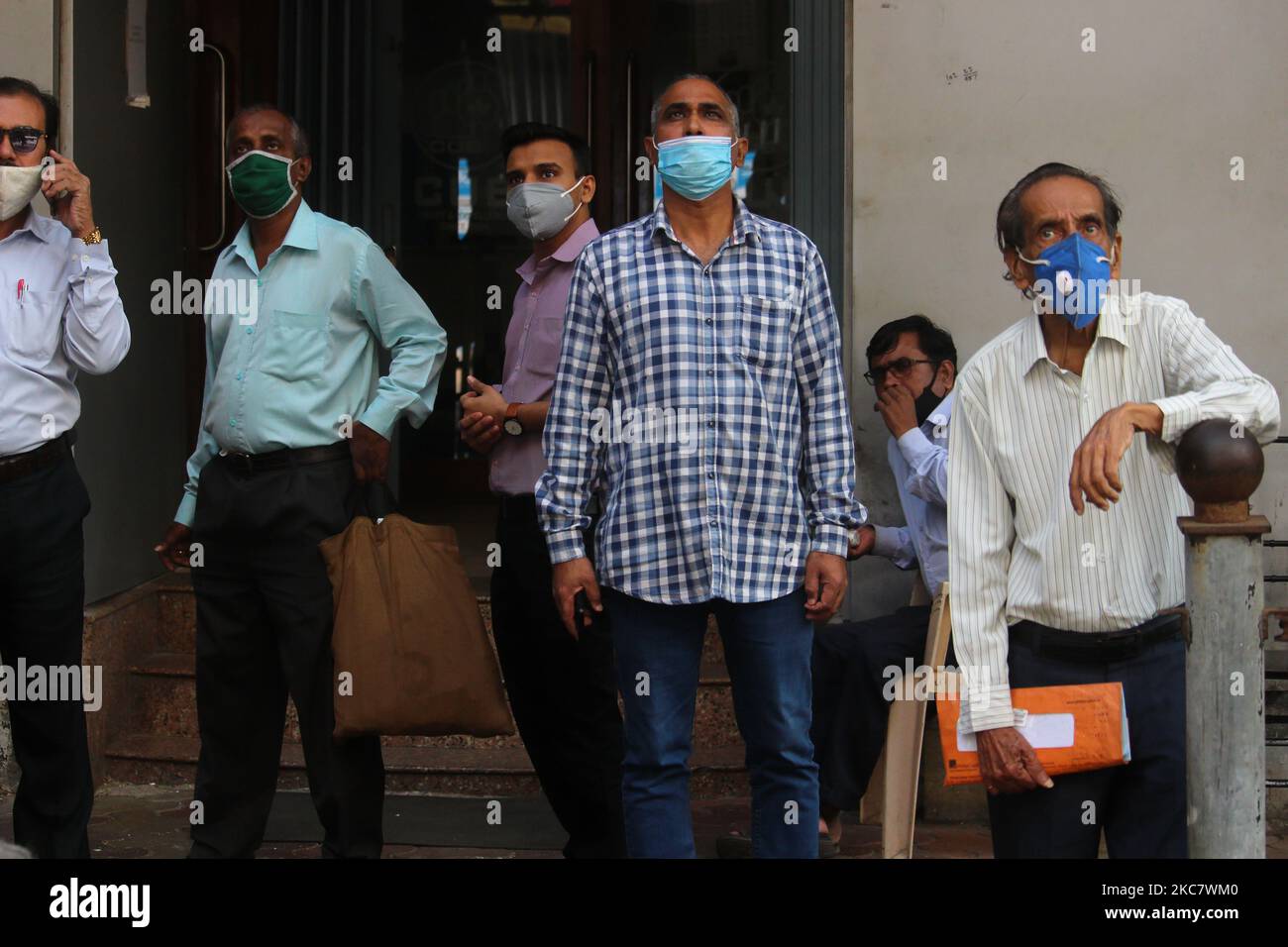 People look at a display of stock prices outside the Bombay Stock Exchange (BSE) building in Mumbai, India on January 21, 2021. (Photo by Himanshu Bhatt/NurPhoto) Stock Photo