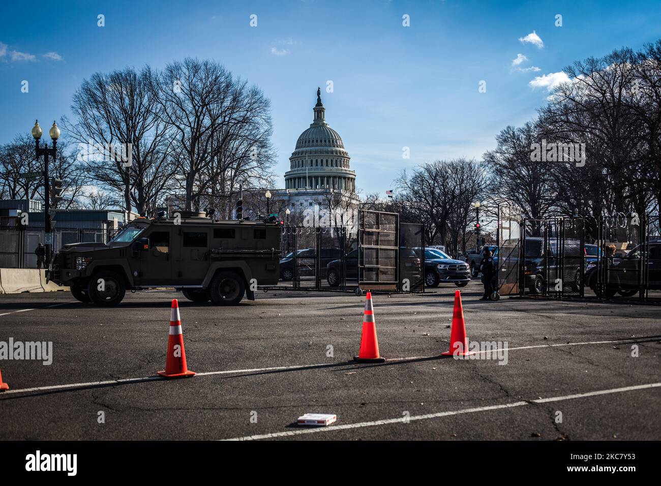 An Armored Personnel Carrier drives past the security gate out of the secure zone of the US Capitol, in Washington DC, United States, on January 20, 2021. (Photo by Shay Horse/NurPhoto) Stock Photo