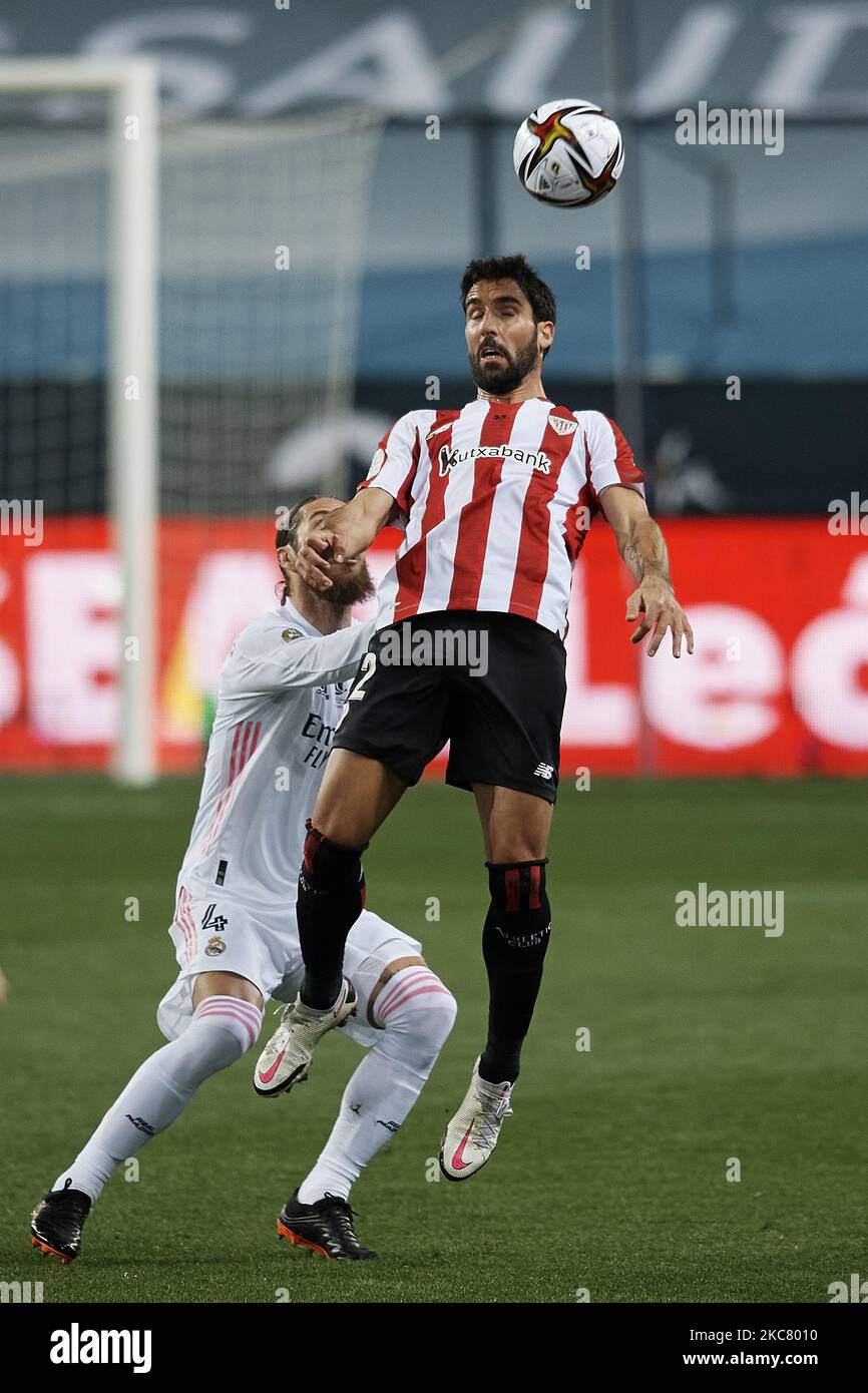 Raul Garcia of Athletic and Sergio Ramos of Real Madrid compete for the ball during the Supercopa de Espana Semi Final match between Real Madrid and Athletic Club at Estadio La Rosaleda on January 14, 2021 in Malaga, Spain. (Photo by Jose Breton/Pics Action/NurPhoto) Stock Photo
