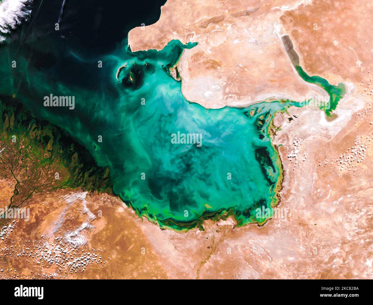 Aerial view of Caspian sea. Abstract turquoise shapes on the sea. nature landscape background or wallpaper. Elements of this image furnished by NASA. Stock Photo