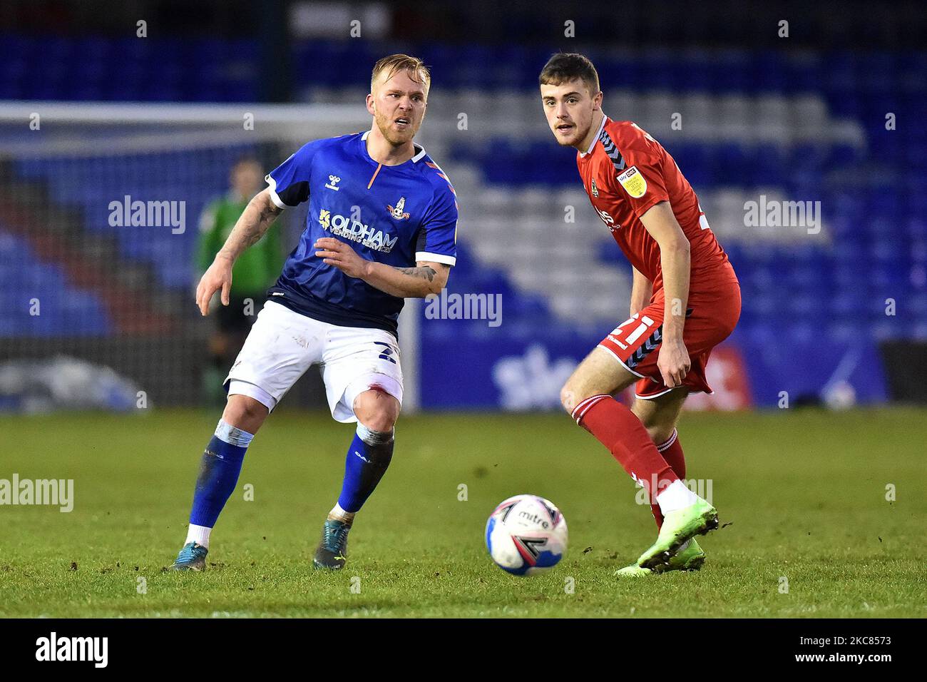Oldham Athletic's Marcel Hilssner tussles with Lewis Collins of Newport County during the Sky Bet League 2 match between Oldham Athletic and Newport County at Boundary Park, Oldham on Saturday 23rd January 2021. (Photo by Eddie Garvey/MI News/NurPhoto) Stock Photo