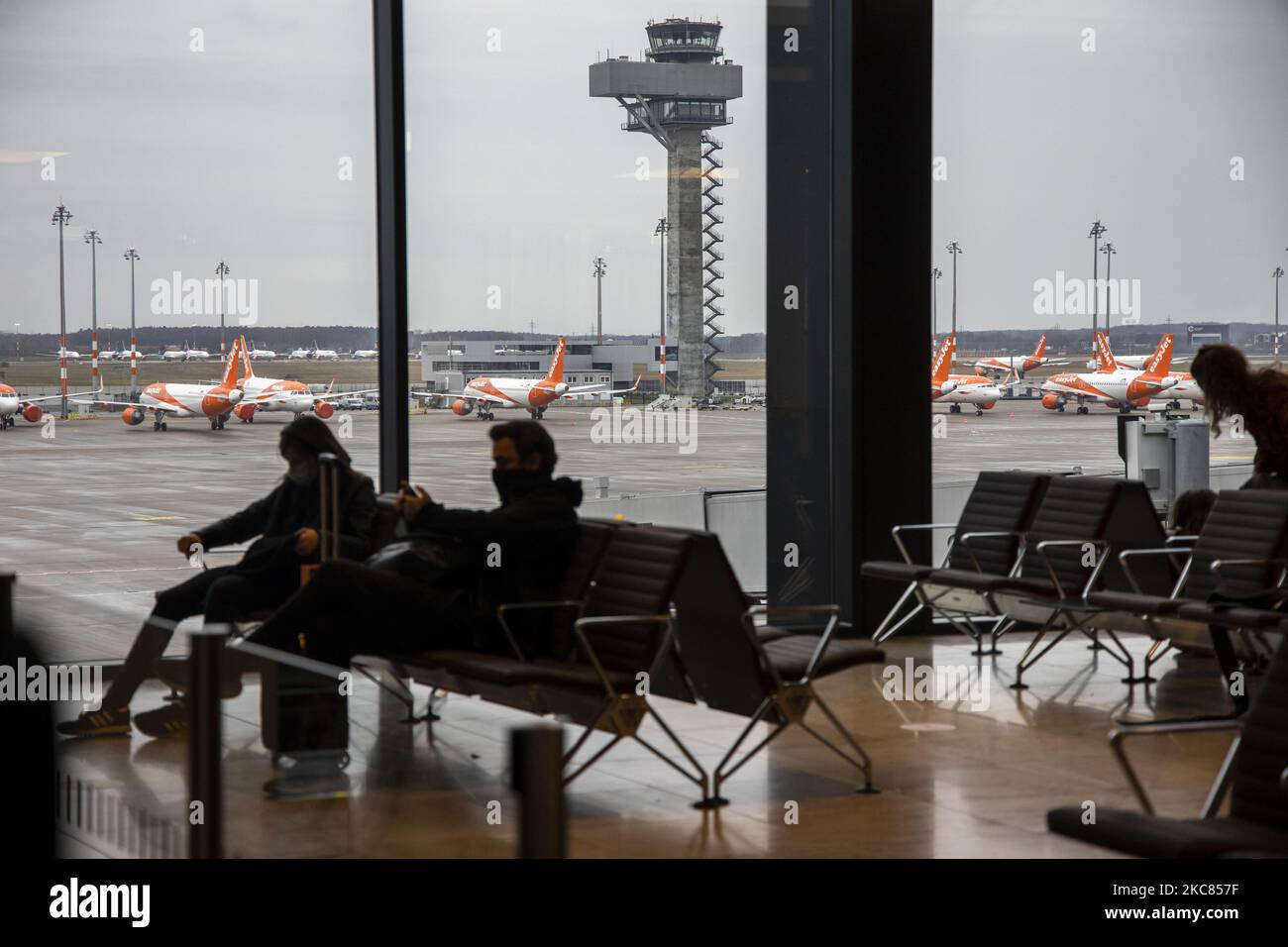Travellers await for embarkment at BER Berlin Brandenburg Airport in Schoenefeld, Germany on January 19, 2021. (Photo by Emmanuele Contini/NurPhoto) Stock Photo