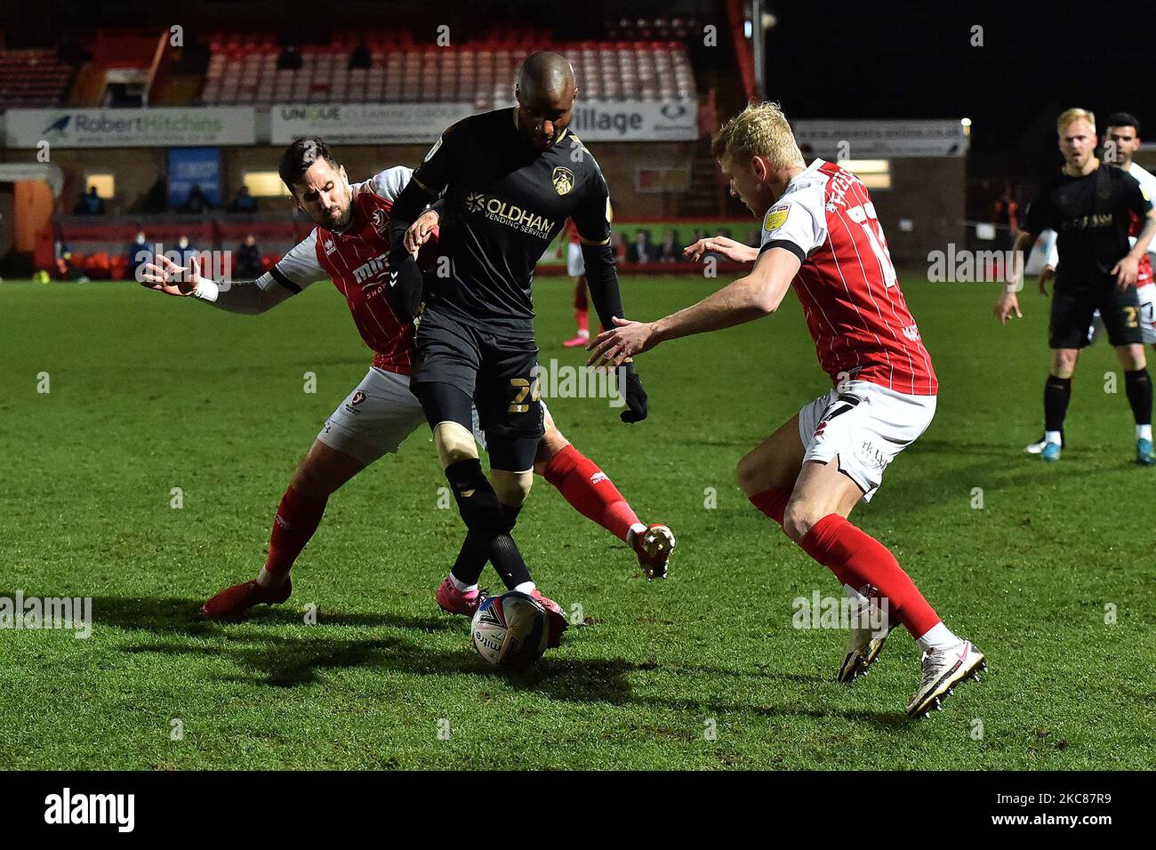 Oldham Athletic's Dylan Bahamboula tussles with Lewis Freestone of Cheltenham Town during the Sky Bet League 2 match between Cheltenham Town and Oldham Athletic at the Abbey Business Stadium, Cheltenham on Tuesday 26th January 2021. (Photo by Eddie Garvey/MI News/NurPhoto) Stock Photo