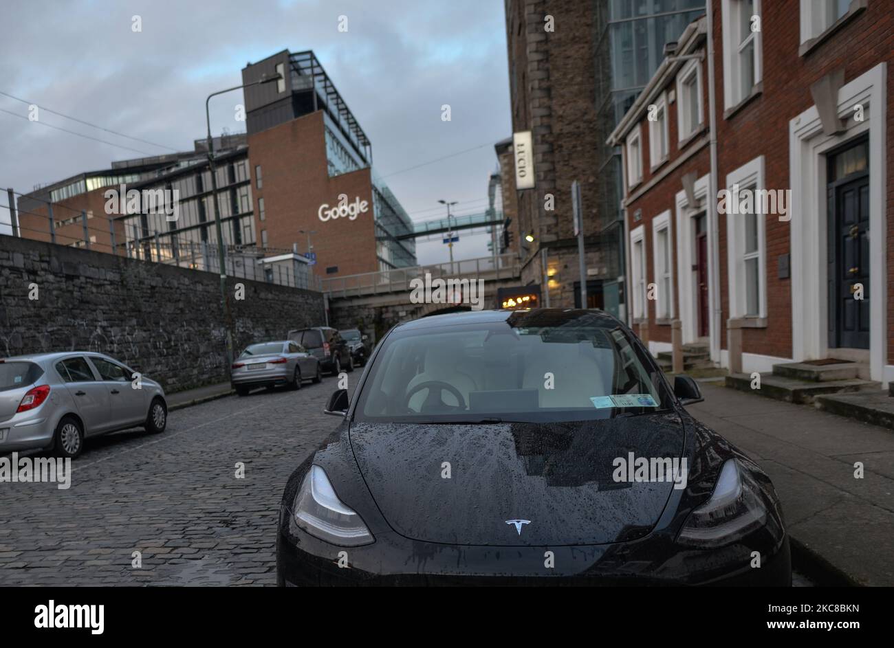 A view of a Tesla car parked close to a Google building GRCQ1 in Dublin's Grand Canal area. On Friday, 29 January, 2021, in Dublin, Ireland.On Friday, 29 January, 2021, in Dublin, Ireland. (Photo by Artur Widak/NurPhoto) Stock Photo