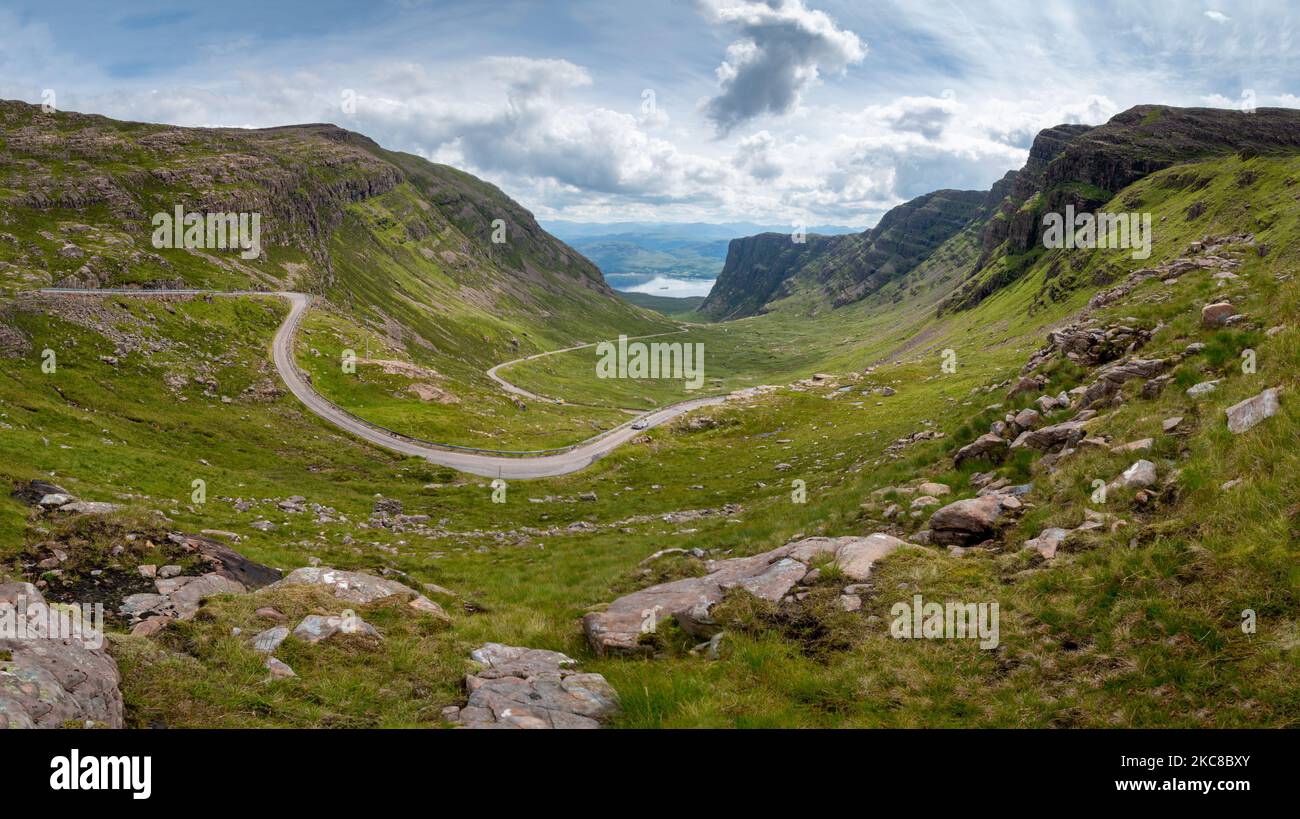 The pass of the Cattle,a winding single track road through mountains of the Applecross peninsula, in Wester Ross,Scottish Highlands.Tall cliff like mo Stock Photo