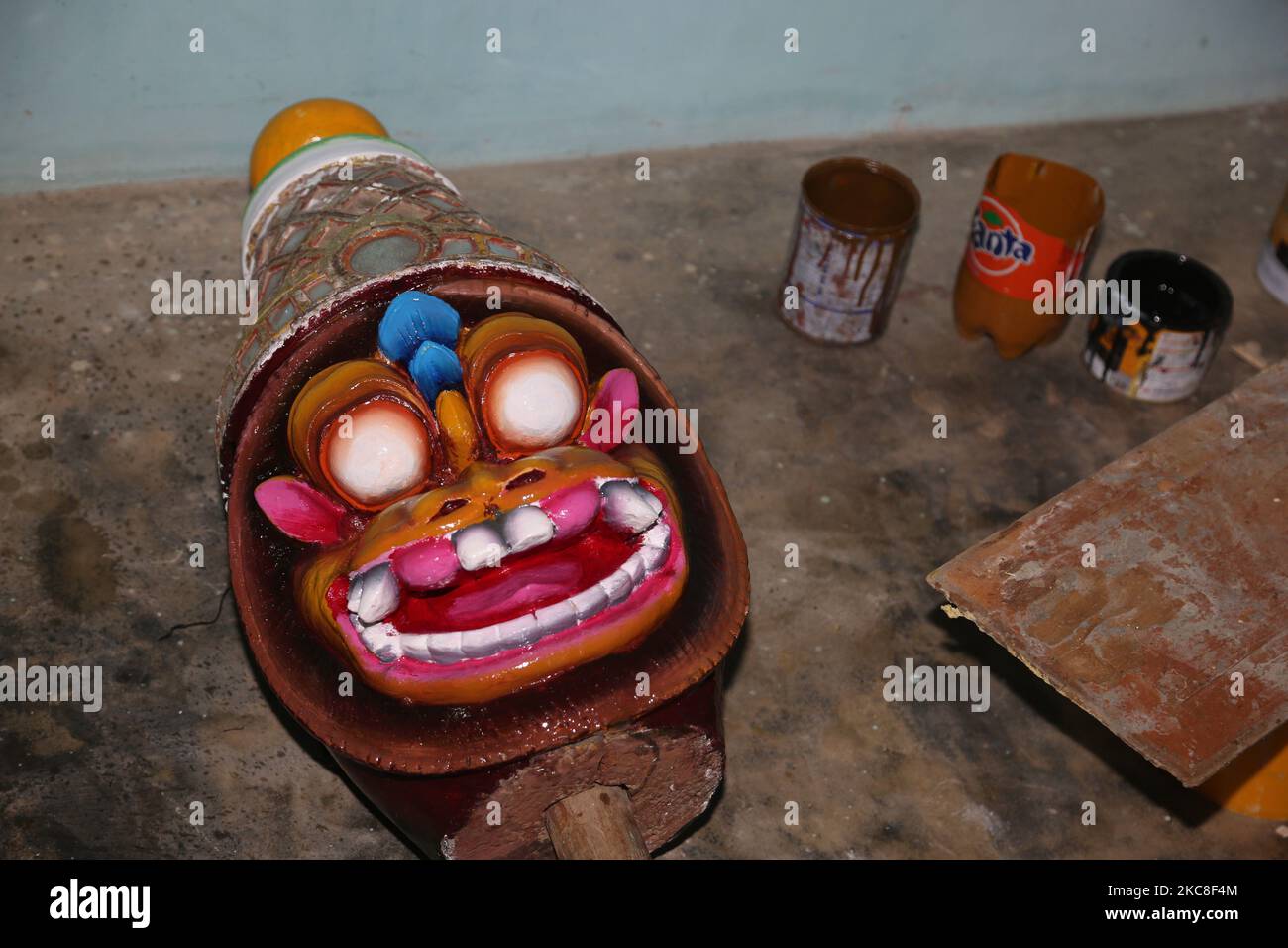 Freshly painted head of a wooden figure dries at the Arasadi Vinayagar Temple (Arasadi Sithi Vinayagar Kovil) in Jaffna, Sri Lanka. This temple is dedicated to Lord Ganesh and is known for its opulent annual chariot festival. (Photo by Creative Touch Imaging Ltd./NurPhoto) Stock Photo